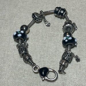 Elegant Black and Silver Charm Bracelet